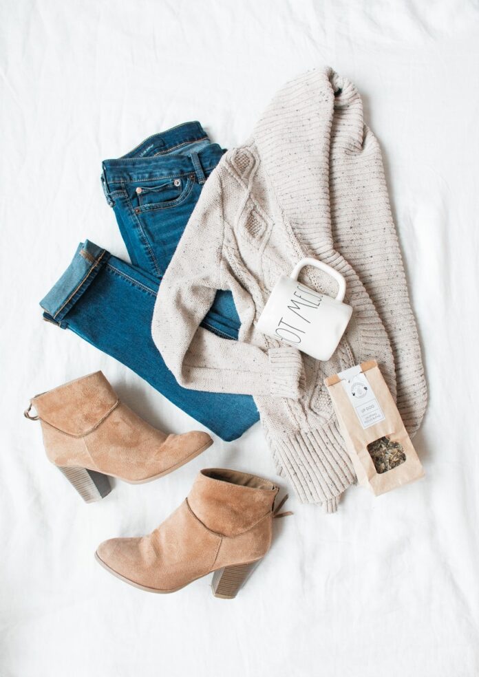 Photo by Heather Ford gray cardigan, blue jeans, and pair of brown chunky heeled shoes